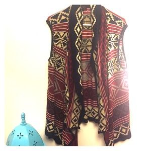 Sleeveless sweater wrap